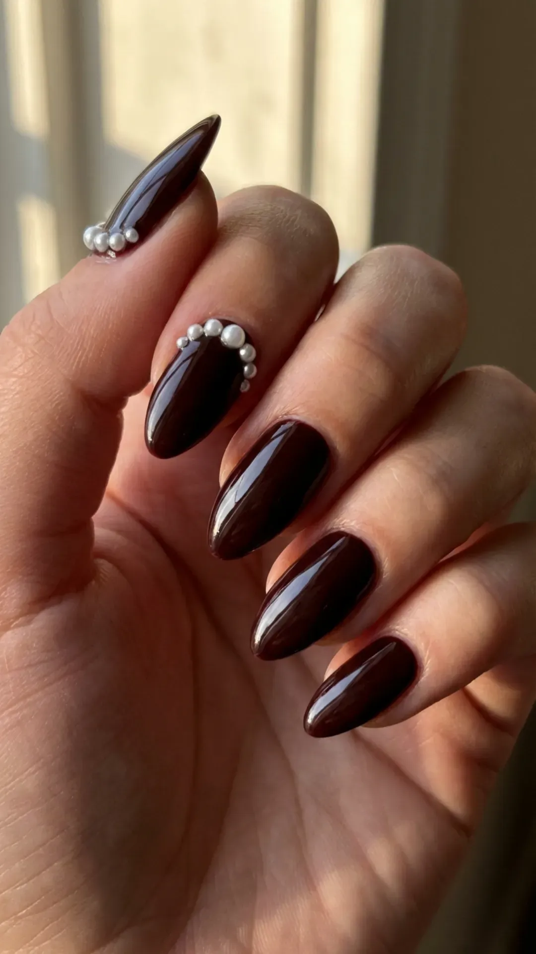 Deep cherry mocha manicure with tiny 3D pearl embellishments VANSWEG.COM