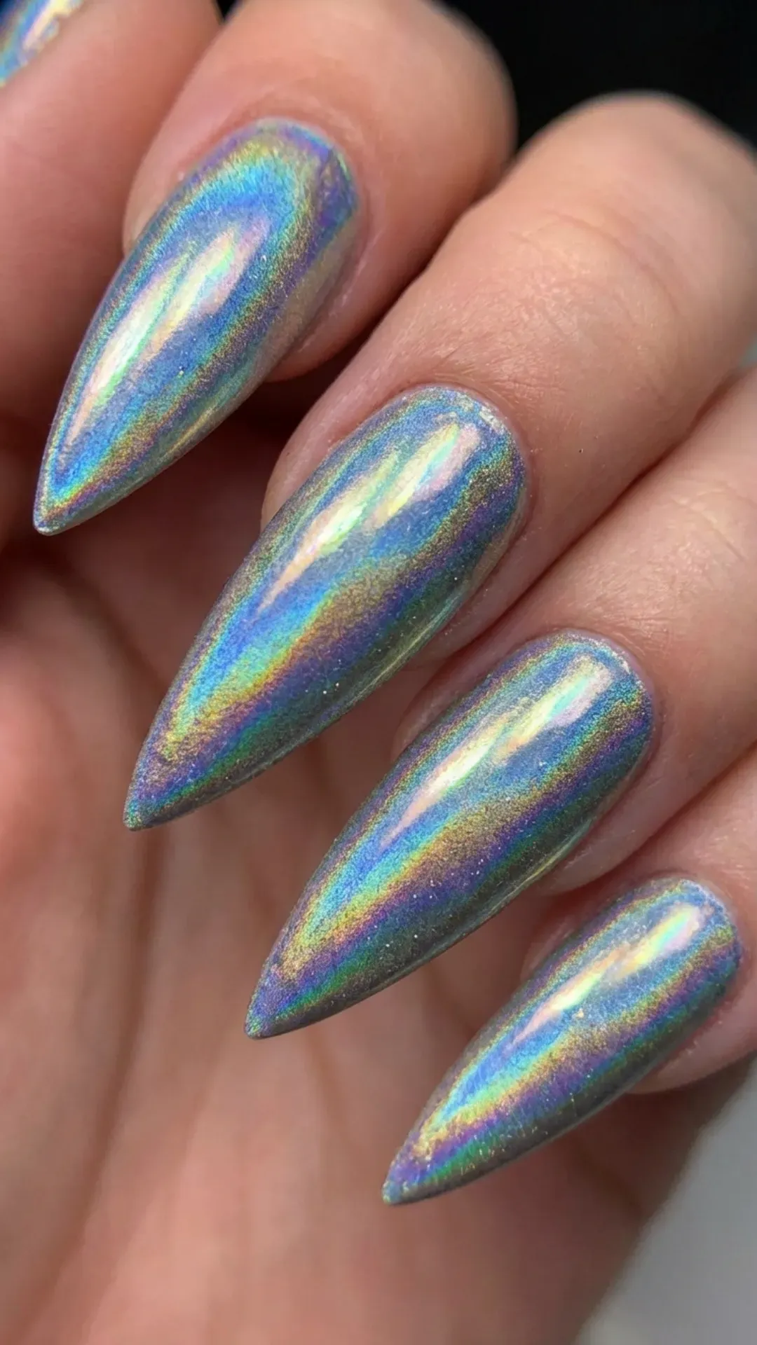 Holographic stiletto nails with rainbow-shifting reflections