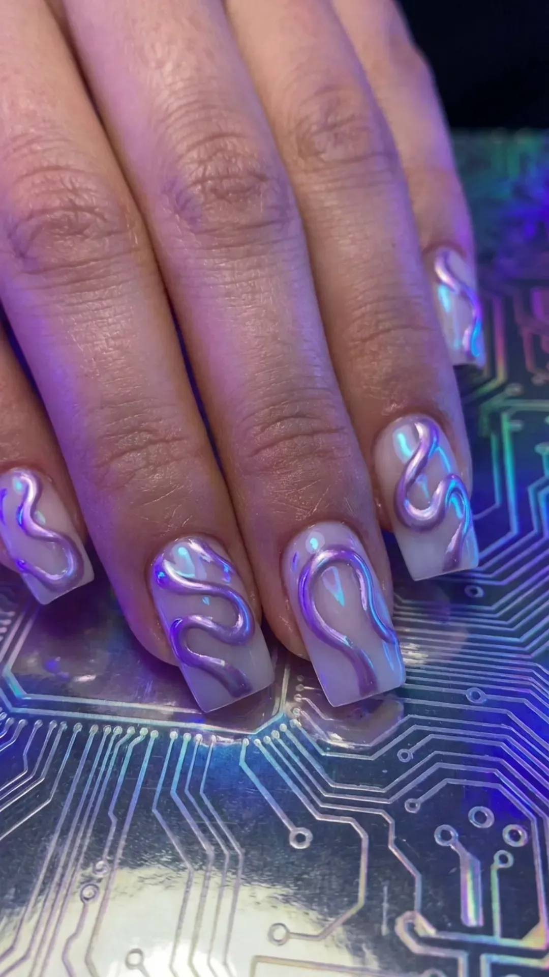 Sheer nails with thick digital lavender chrome wavy swirls VANSWEG.COM