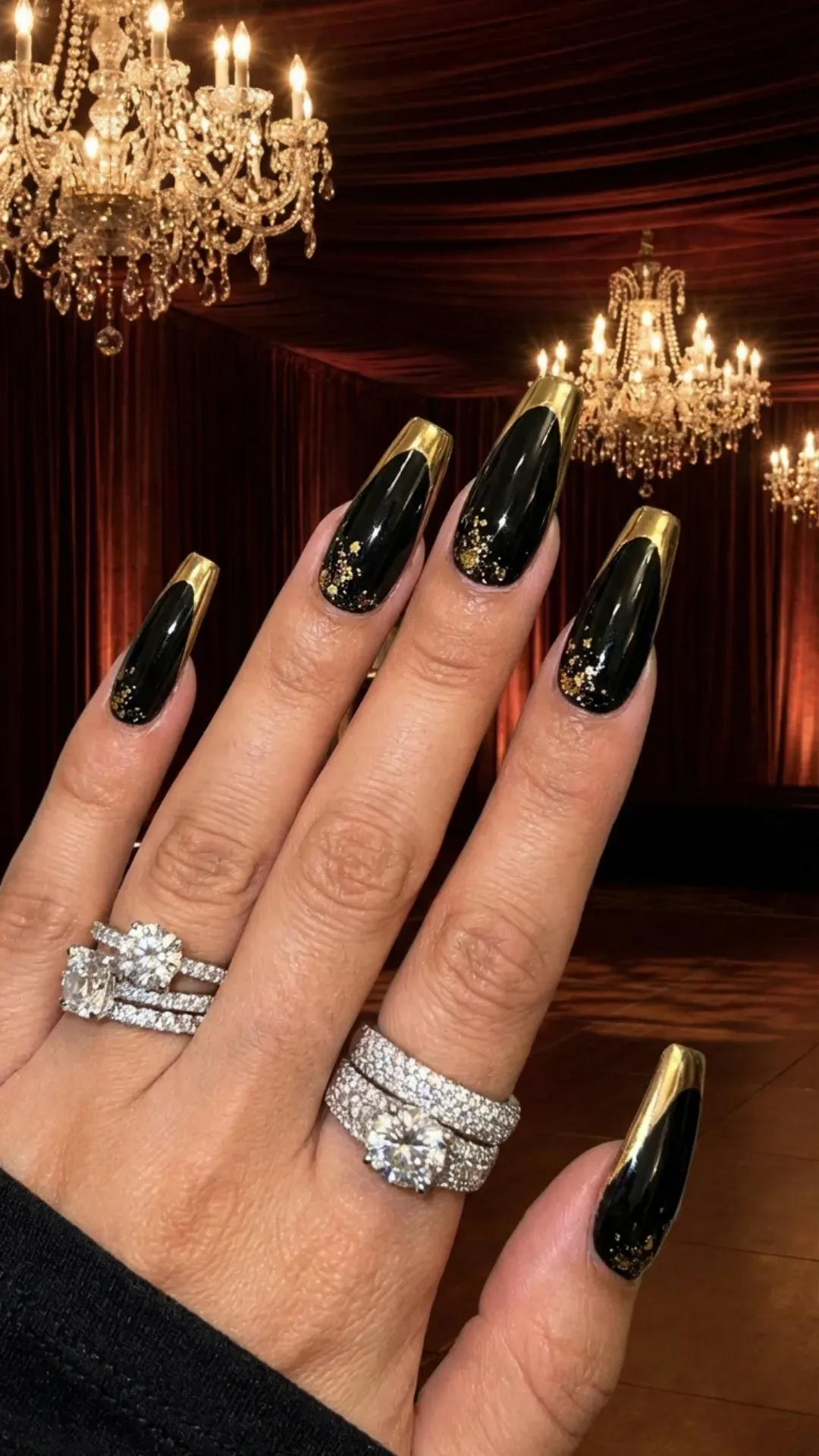 Black coffin prom nails with gold chrome accents, glamorous evening manicure