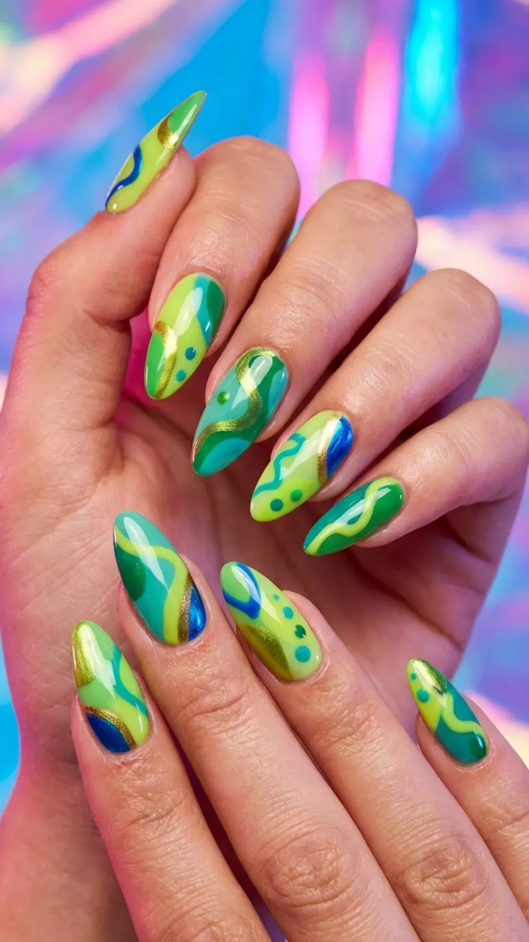 Funky green prom nails with abstract patterns and bright accents