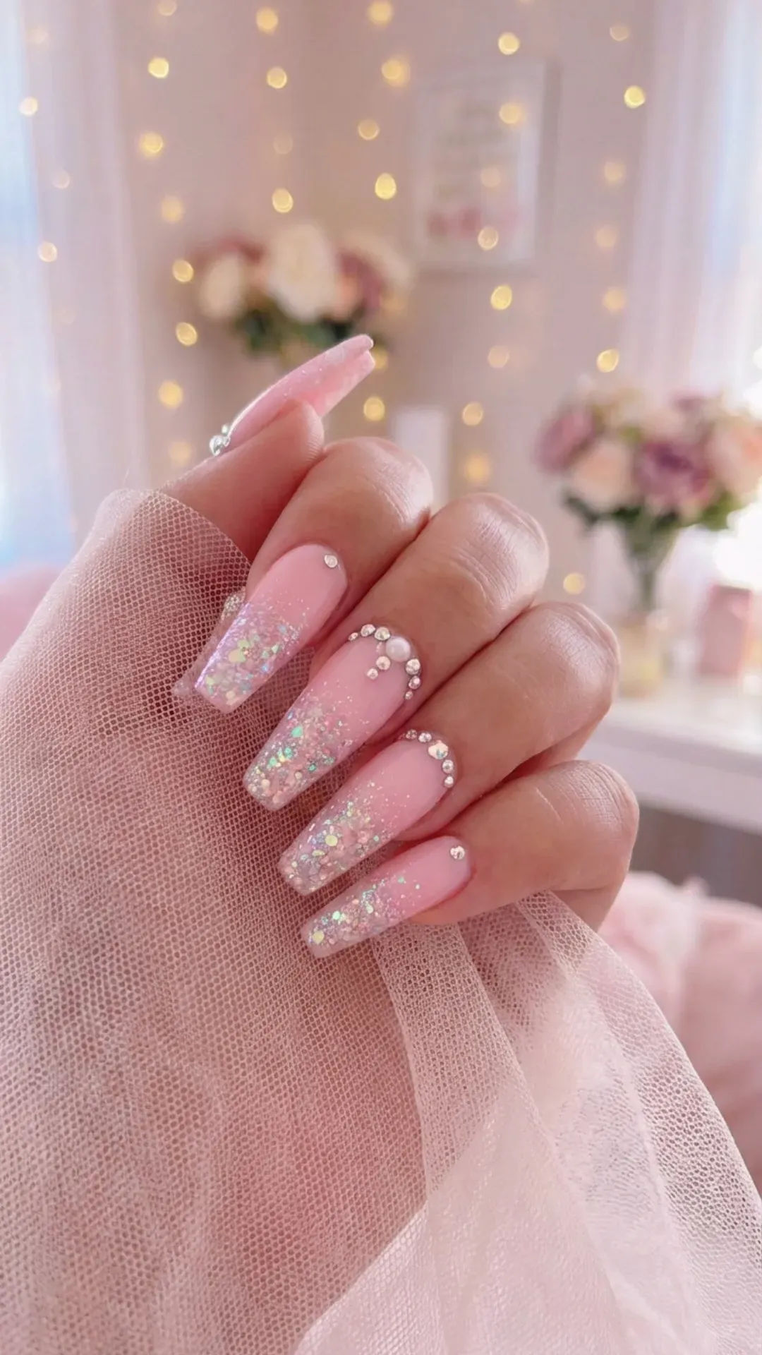 Long ballerina pink glitter prom nails with rhinestones, princess style manicure