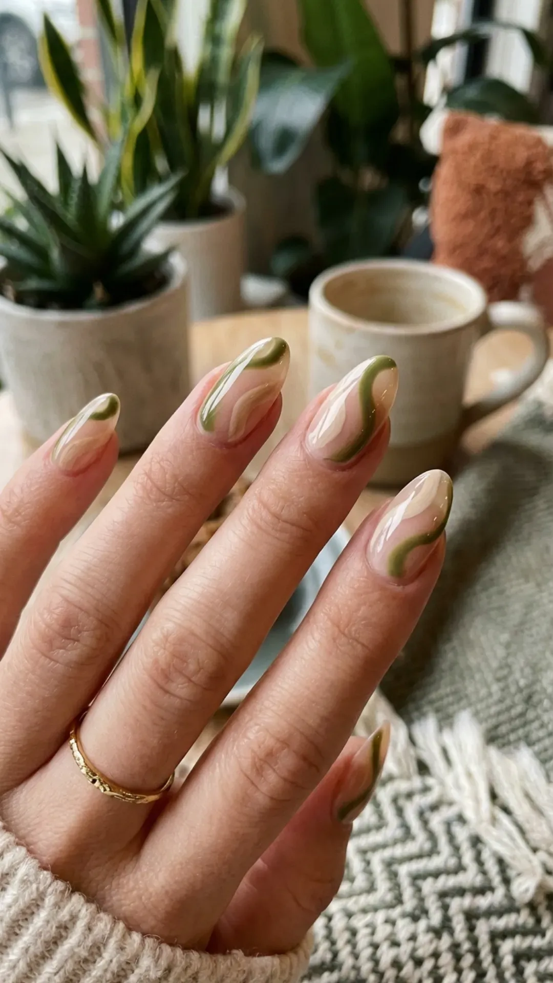 Retro olive green and beige swirl nail art over nude base VANSWEG.COM