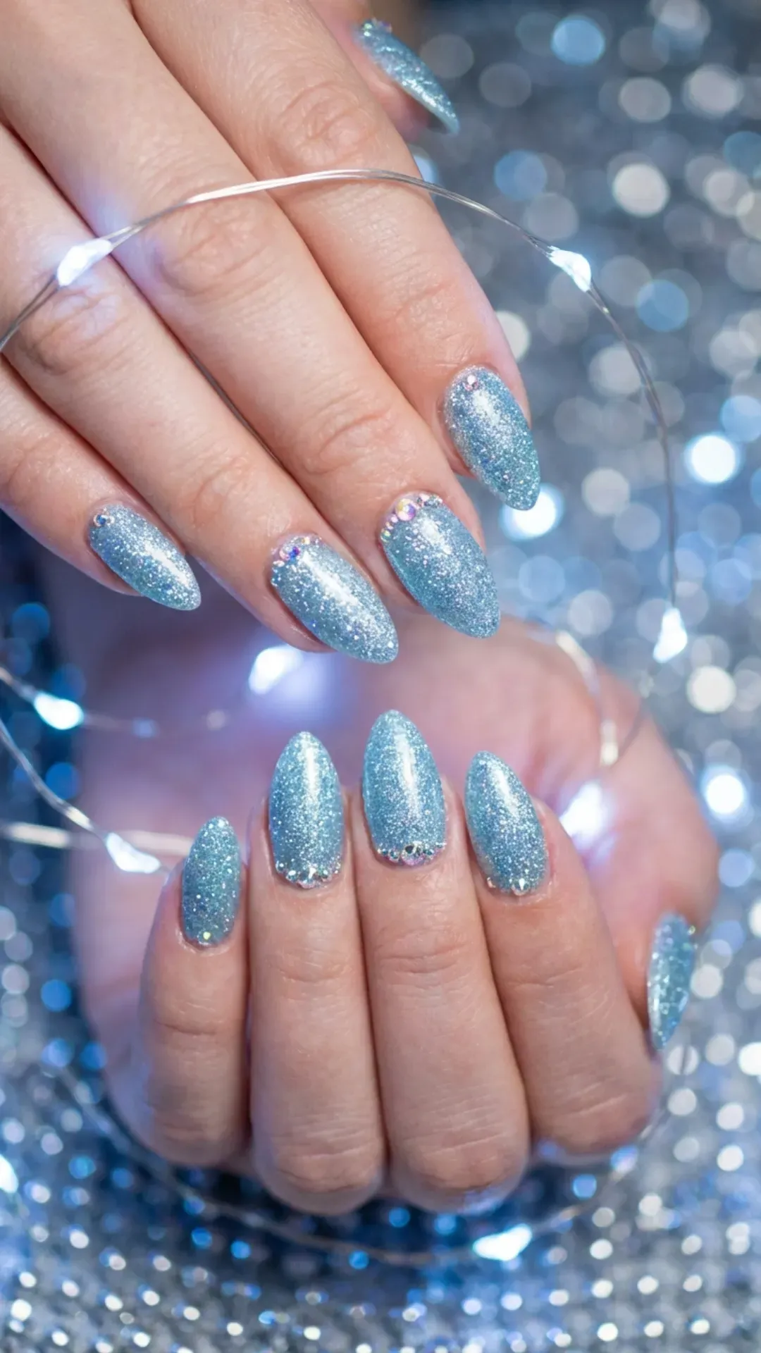 Icy blue glitter prom nails with crystal accents, Cinderella princess style manicure