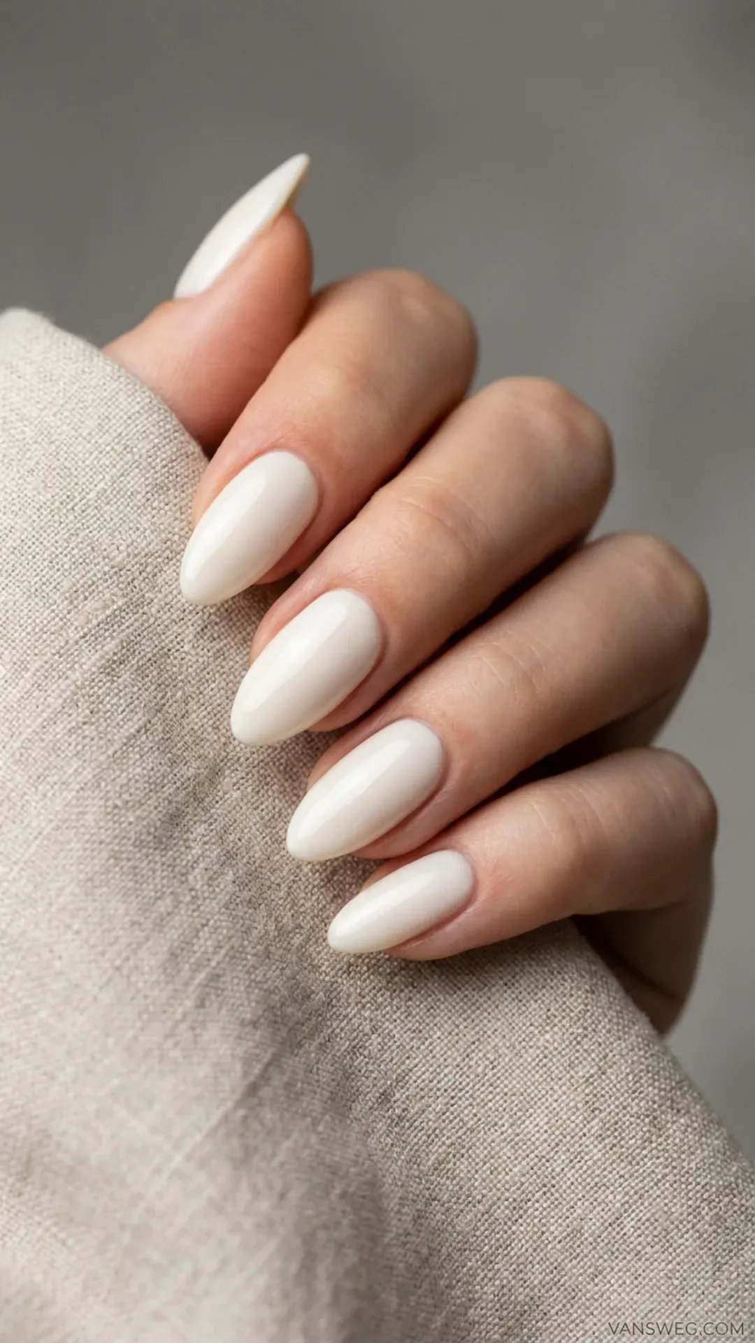glossy cloud dancer off white almond nails minimalist spring 2026 trend by VANSWEG.COM