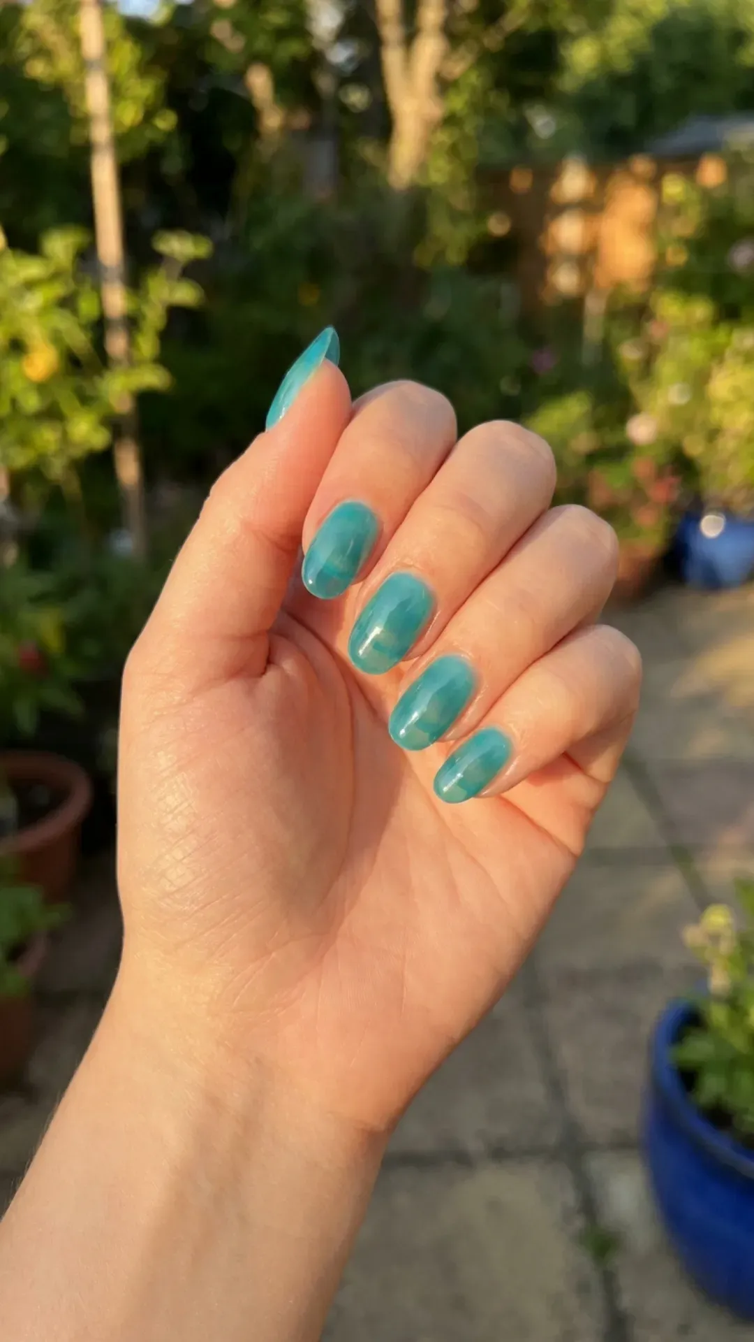 Teal Jelly Syrup Nails - Glossy teal syrup nails under sunlight