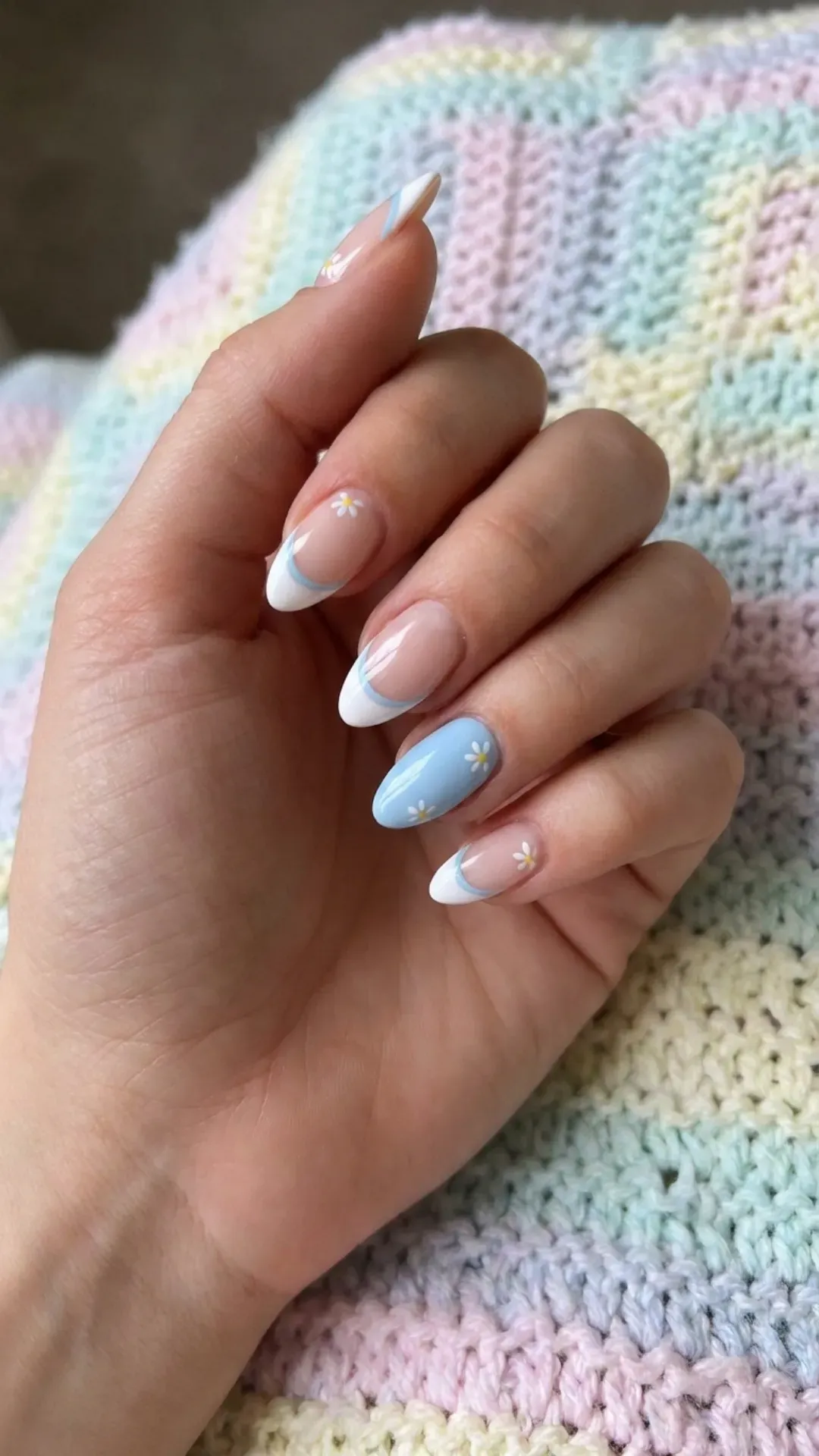 Charming nail design with one nail fully painted in baby blue and matching French tips, creating a cohesive and cute look