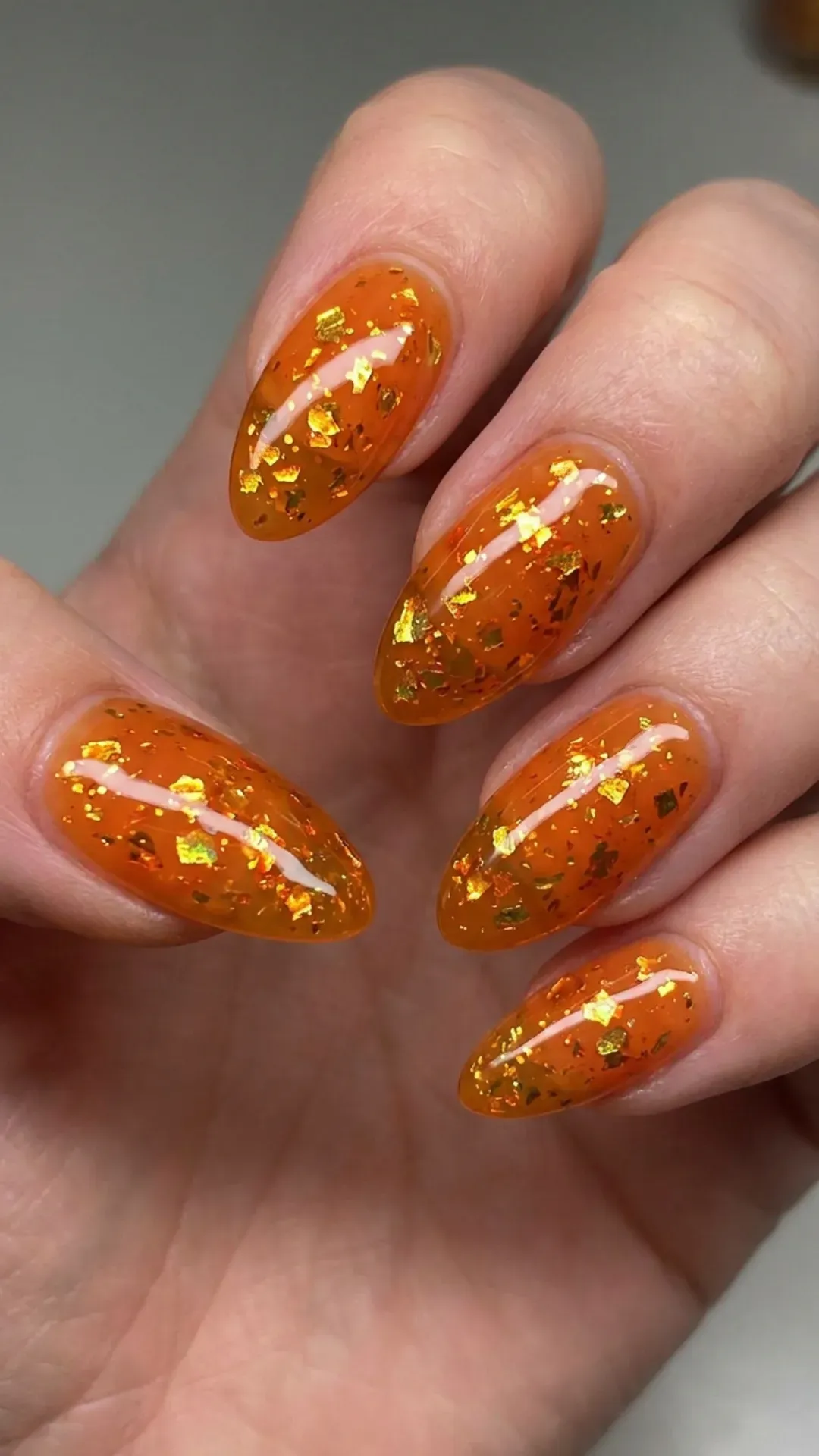 Glitter Tangerine Syrup Nails - Translucent orange syrup nails with chunky glitter pieces