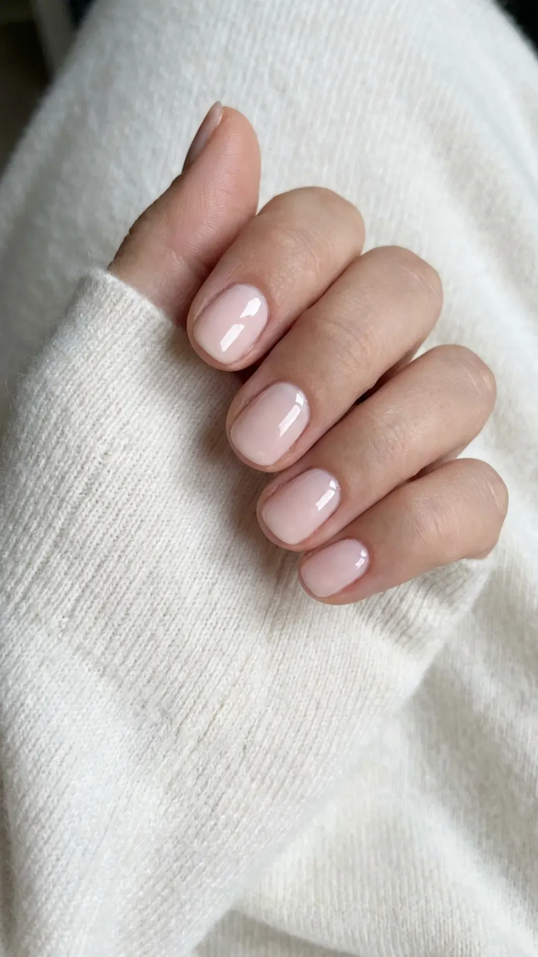 Short Light Pink Glossy Nails - Simple light pink nail polish on short rounded nails