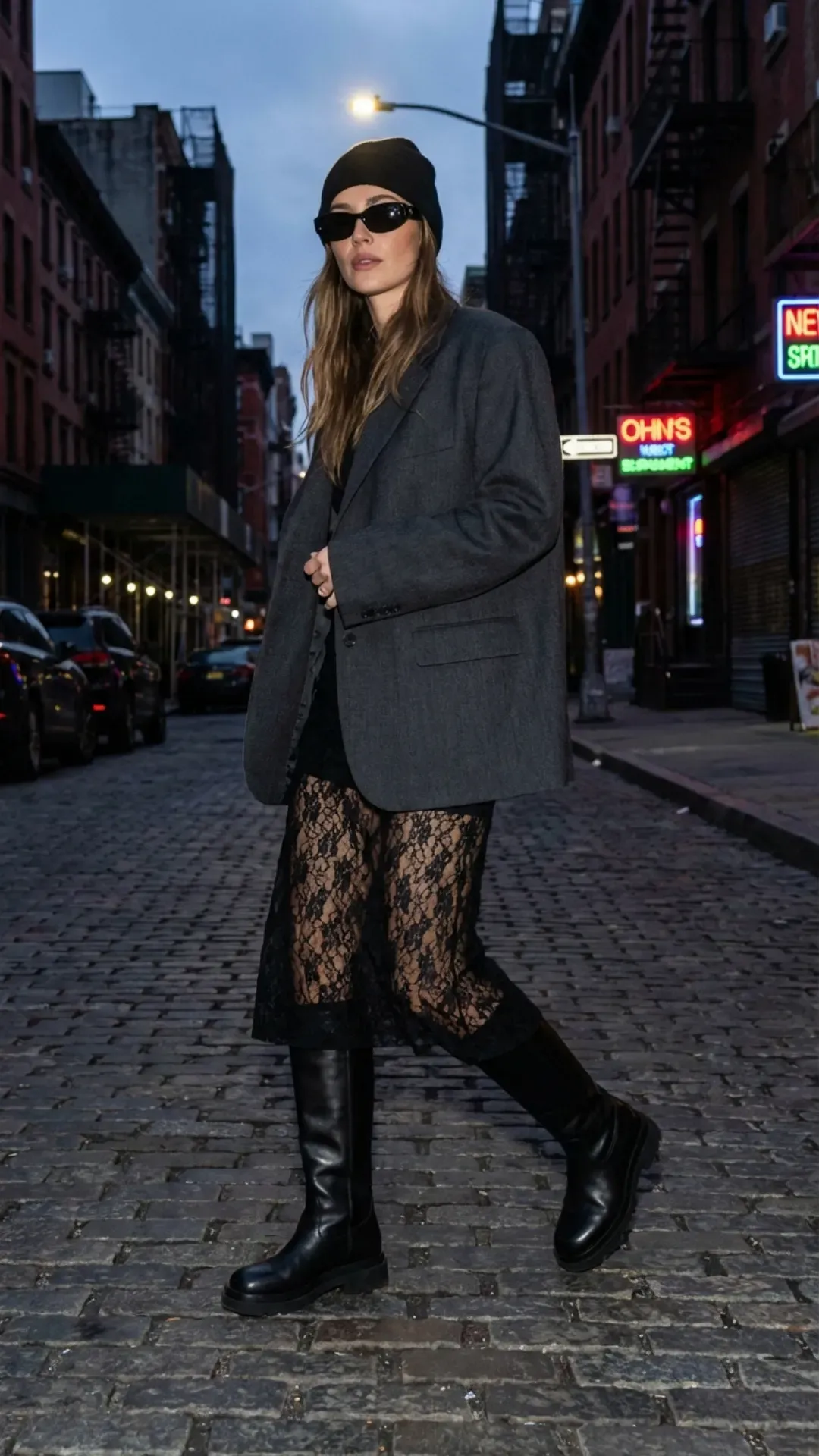 Sheer lace skirt styled with an oversized blazer for a trendy romantic look.