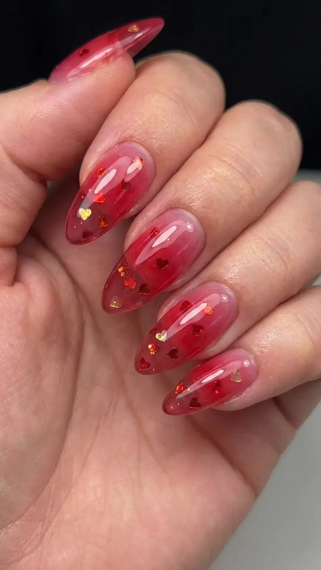 Cherry Syrup Nails with Hearts - Glossy red-pink syrup nails with small embedded hearts