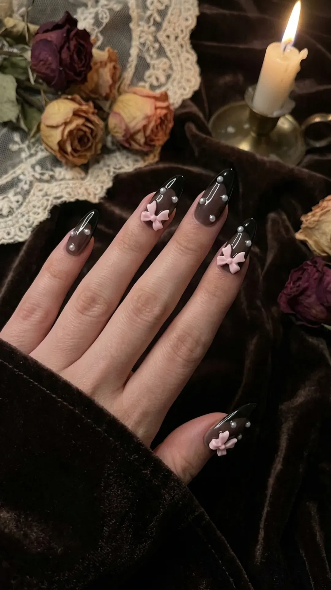 Black French tips combined with scattered pearls and 3D pink bows, embodying the essence of dark coquette aesthetics.