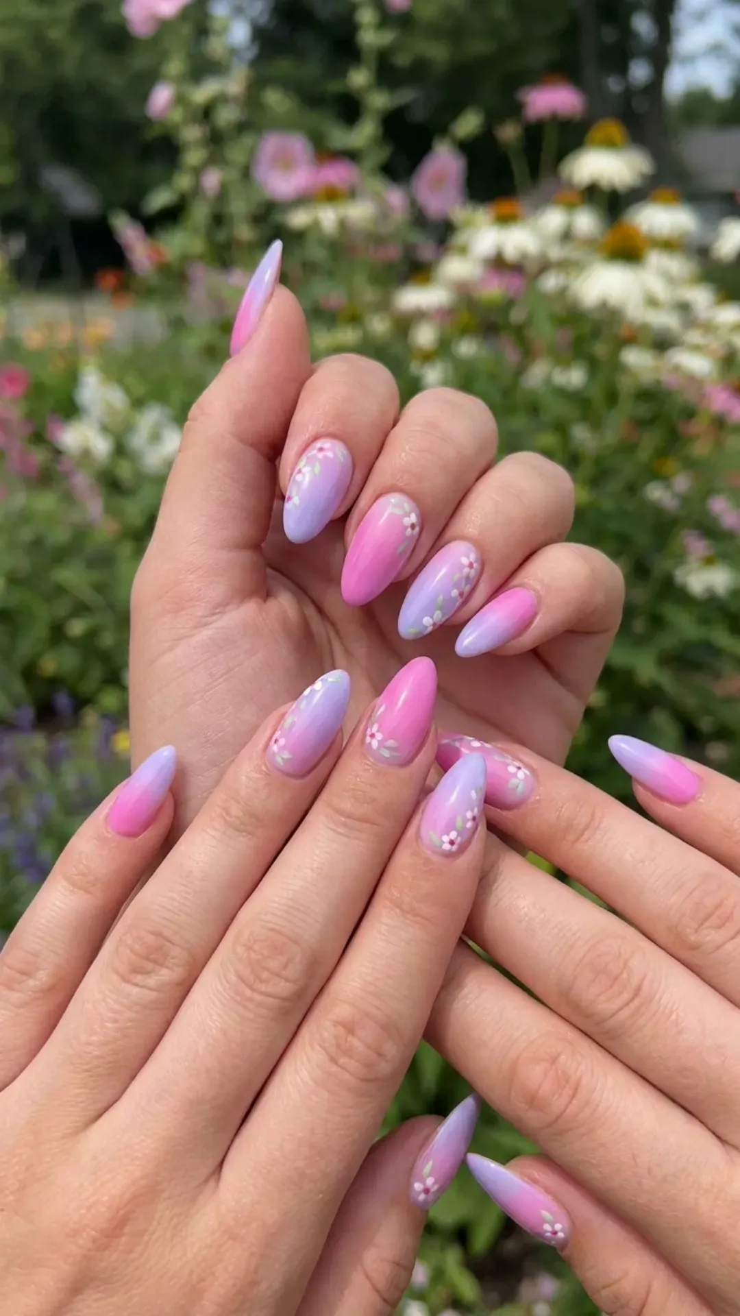 Vibrant nails blending shades of lavender and pink, bold and soft, capturing the essence of a fresh spring blossom