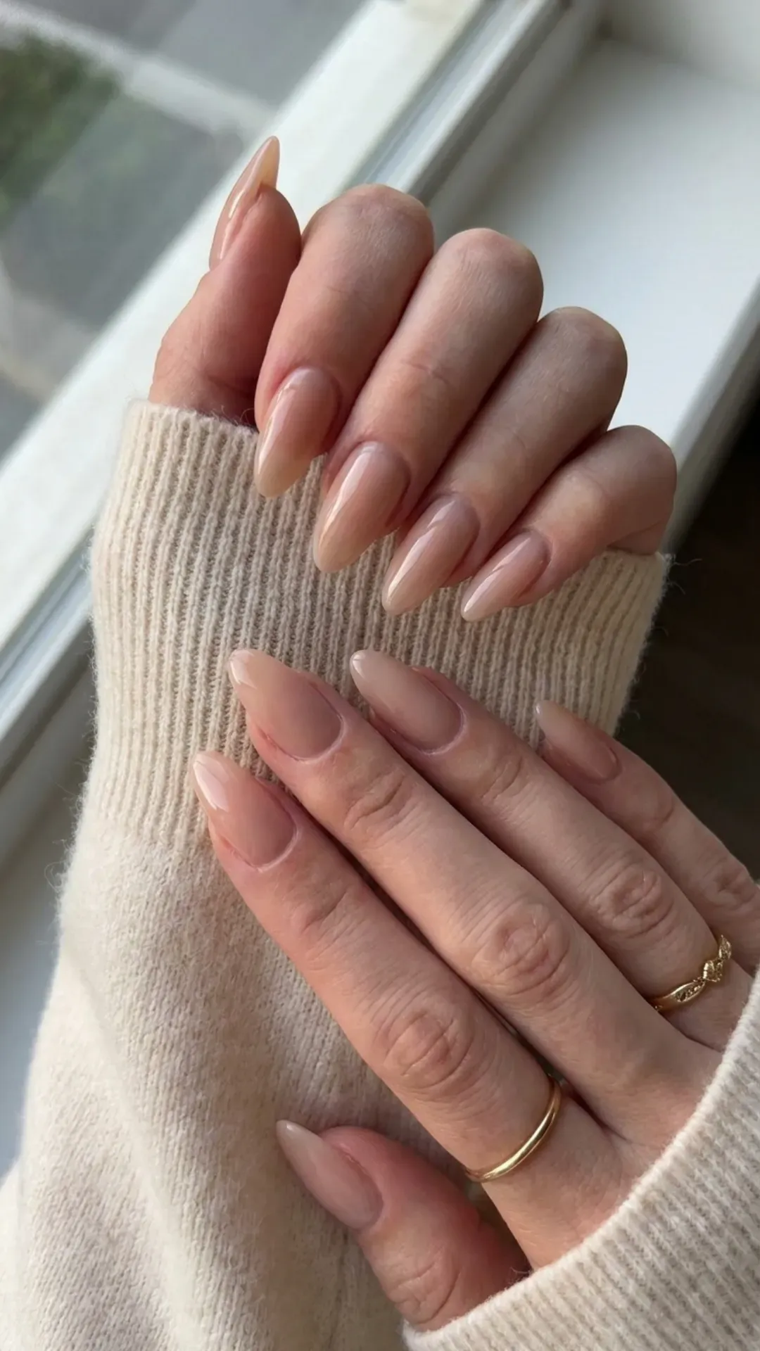 Glossy Nude Almond Nails - Long almond-shaped nails with nude glossy polish