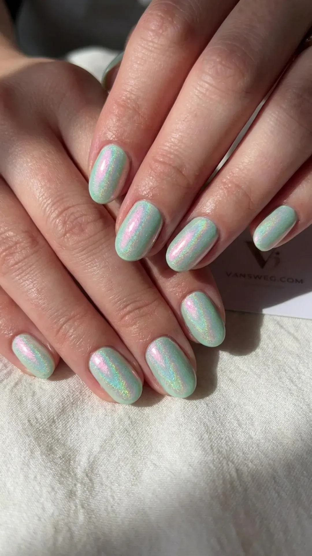 pastel mint green nails with a contrasting pink shift opalescent chrome by VANSWEG.COM