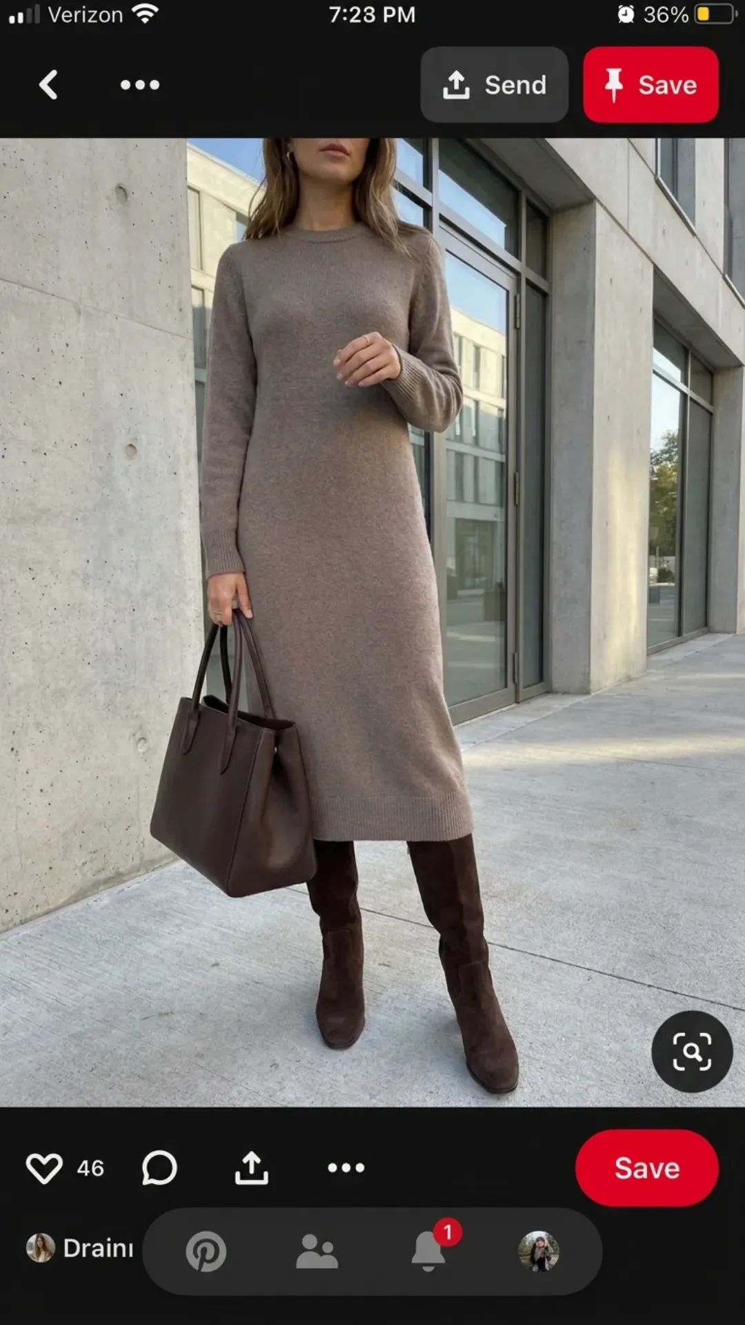 A fashionable woman wearing a taupe ribbed midi sweater dress and knee-high suede boots against a modern architectural background.