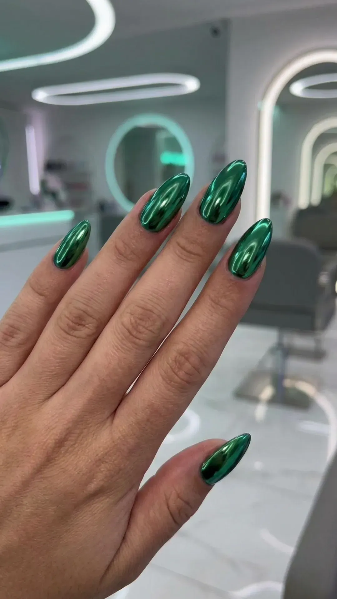 Shiny Emerald Chrome Nails - Metallic emerald green nails with a futuristic chrome finish