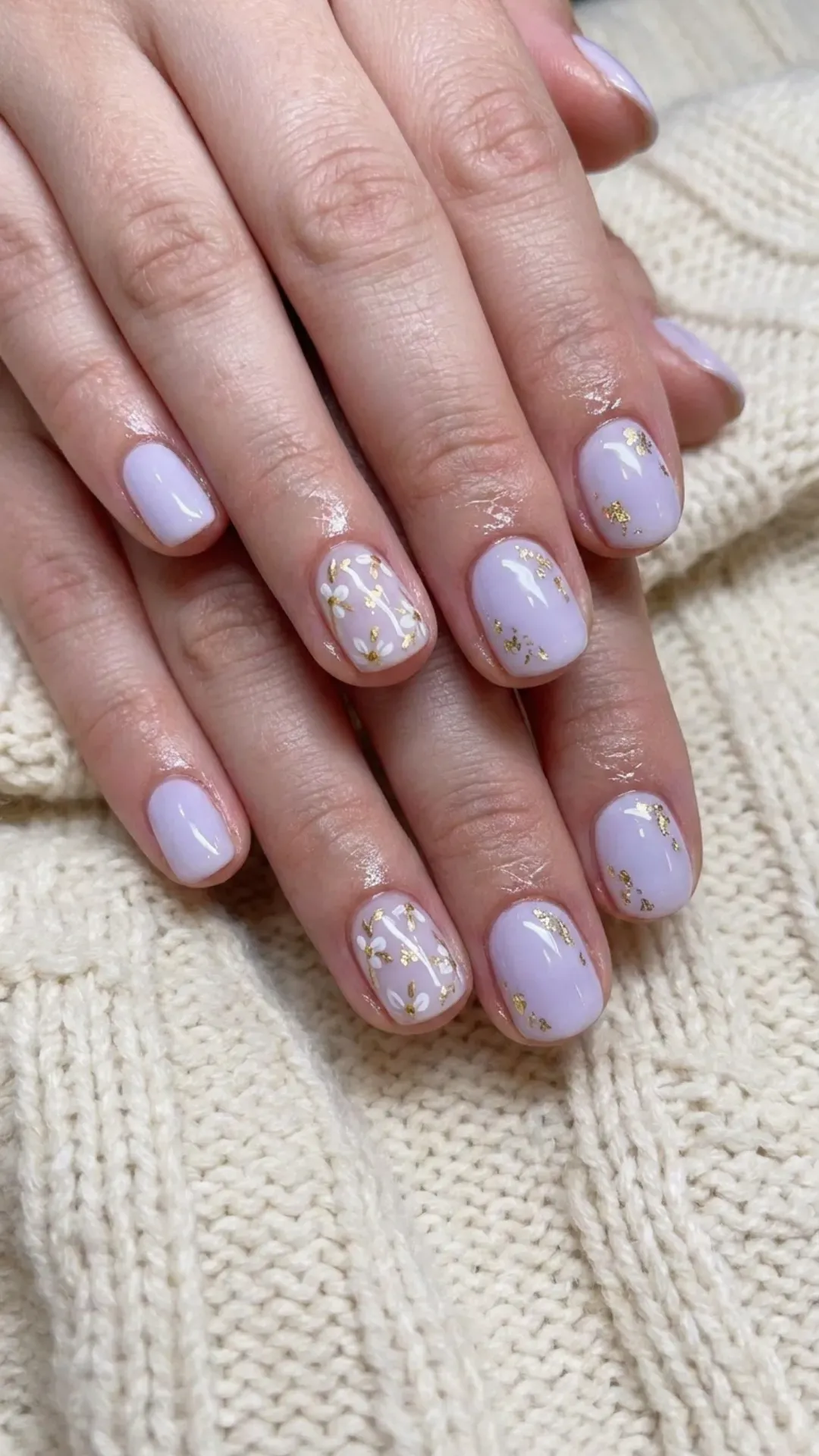 Lavender Nails with Gold Details - Light purple nails with gold accents and small floral designs