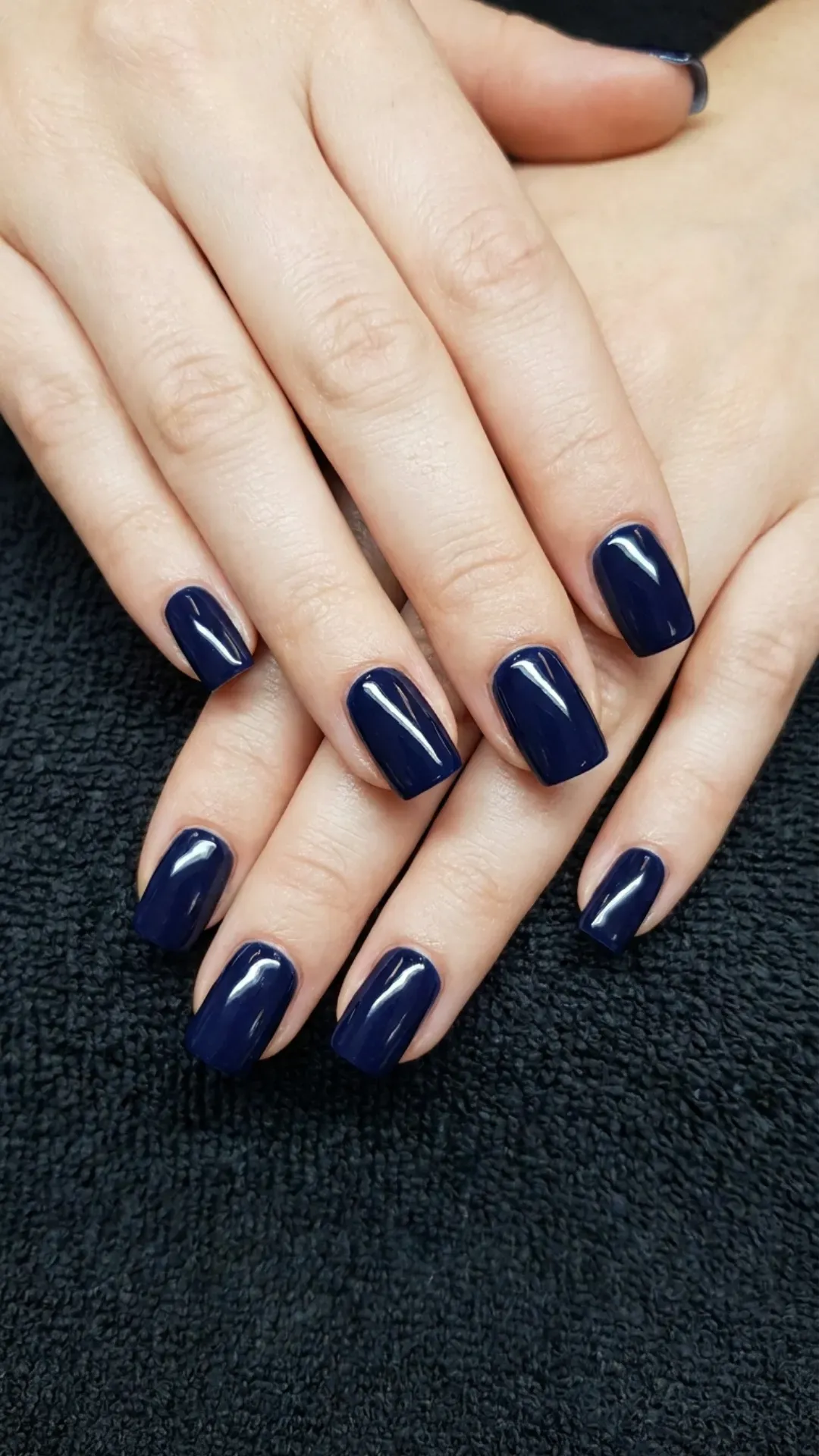 Deep Navy Blue Nails - Hands with square-shaped, shiny navy blue manicure