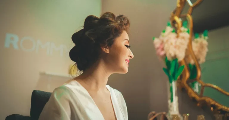 A woman with a stylish updo, showcasing a preview of the '10 Quick and Easy Summer Updos to Beat the Heat in 2024' blog article